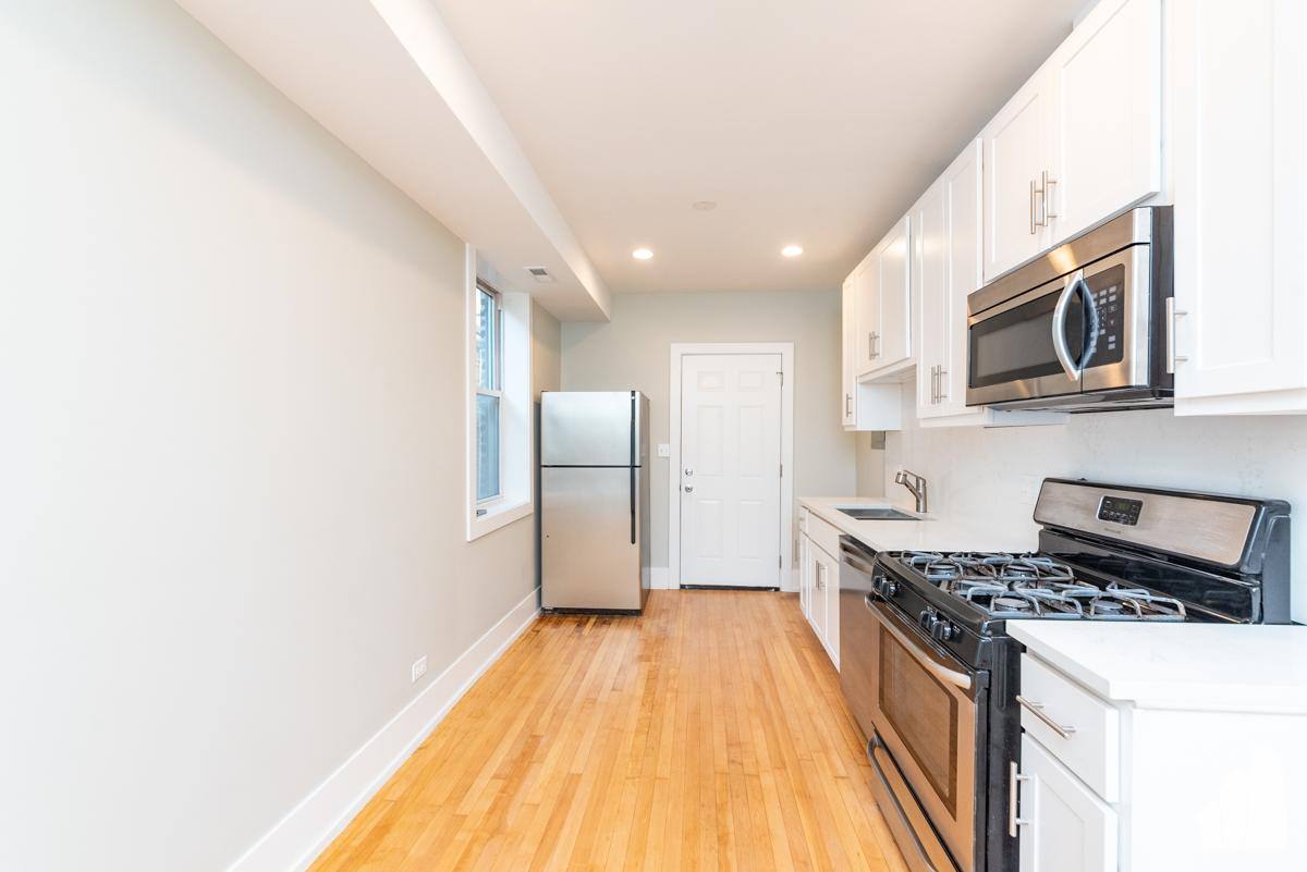 Apartment for rent at 1122 W Addison #1, Chicago, IL 60657