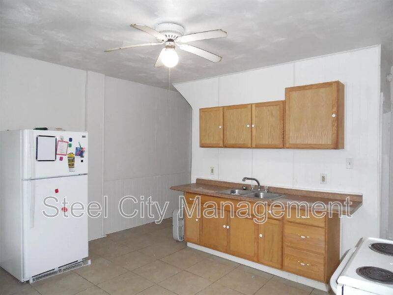 Townhouse for rent at 12 Cuyler Ave, Jeannette, PA 15644