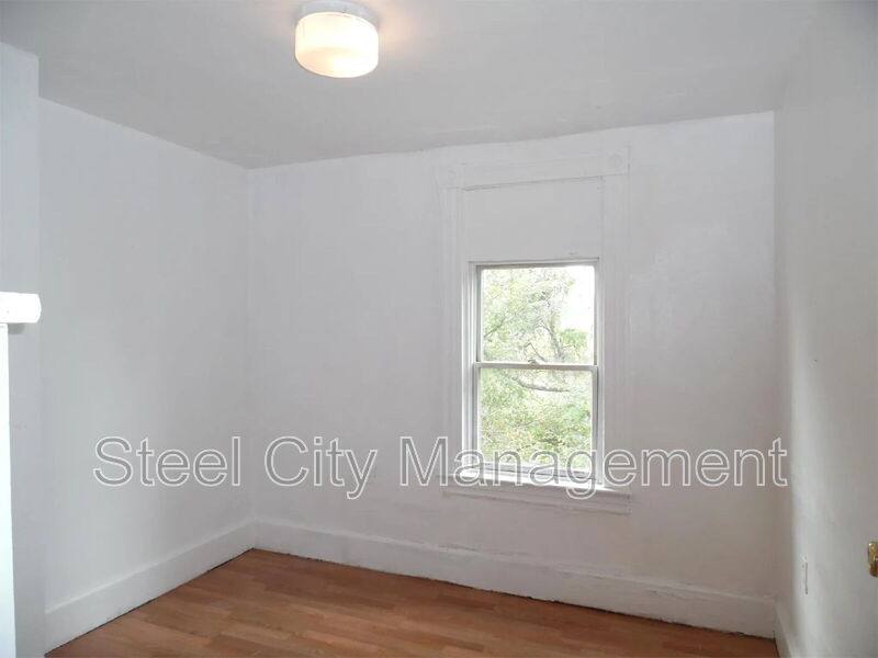 Townhouse for rent at 12 Cuyler Ave, Jeannette, PA 15644