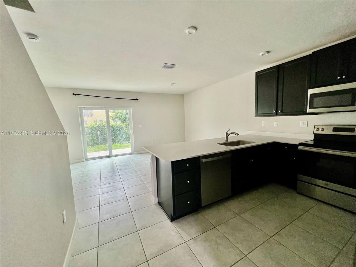 Townhouse for rent at 1045 NW 4th Terrace, Homestead, FL 33034