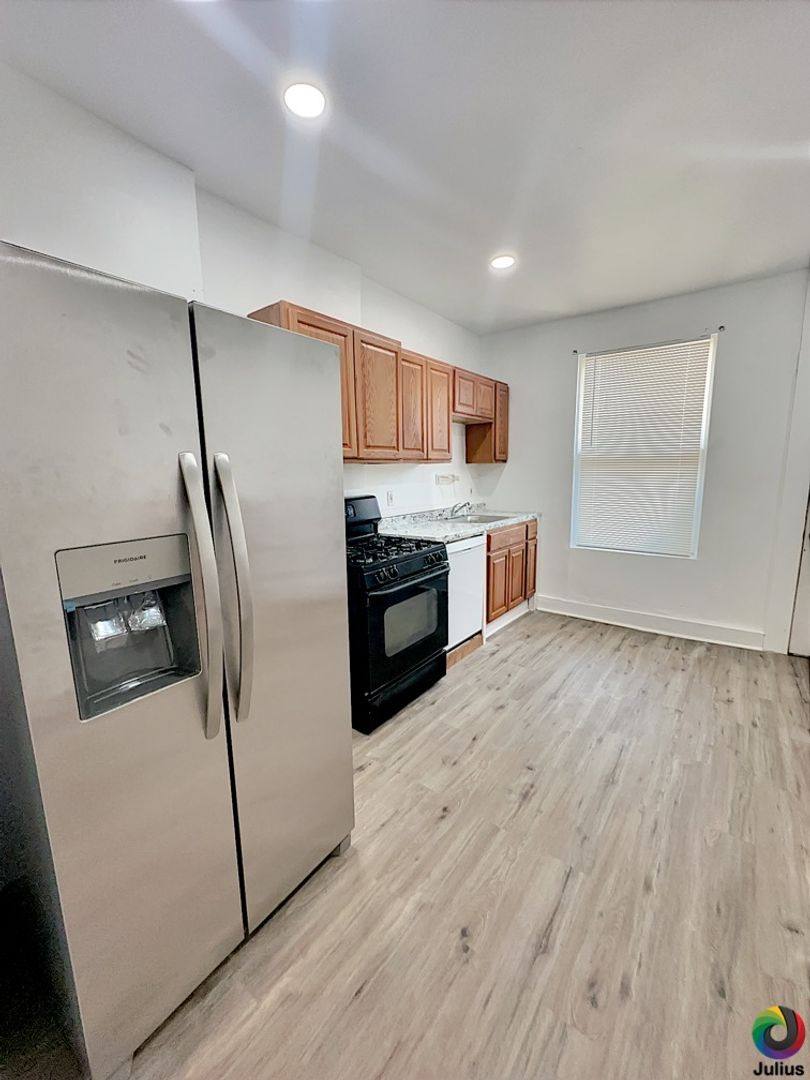 House for rent at 911 N Rose St, Baltimore, MD 21205