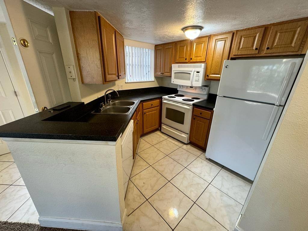 Condo for rent at The Plaza Condominiums, 1940 Lake Atriums Circle #108, Orlando, FL 32839