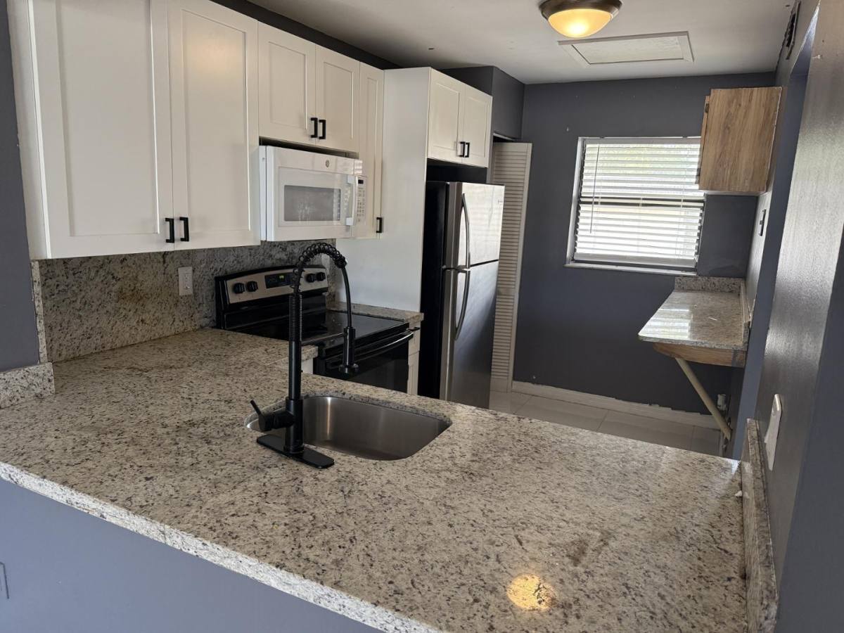 Apartment for rent at 842 NE 209th St #201, Miami, FL 33179