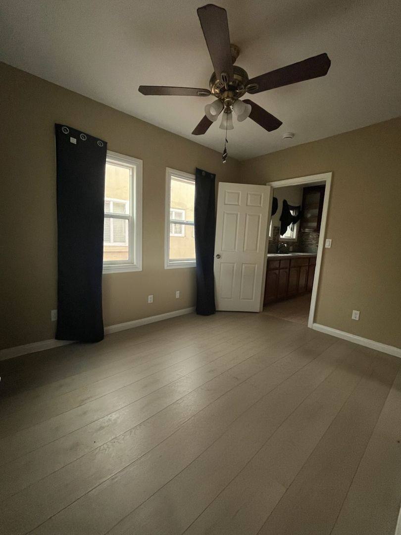 Apartment for rent at 5217 - 5221 1 2 Denker Ave, Los Angeles, CA 90062
