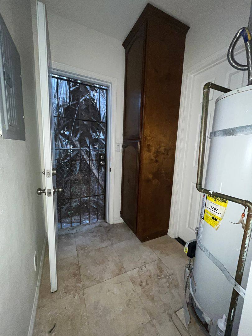 Apartment for rent at 5217 - 5221 1 2 Denker Ave, Los Angeles, CA 90062