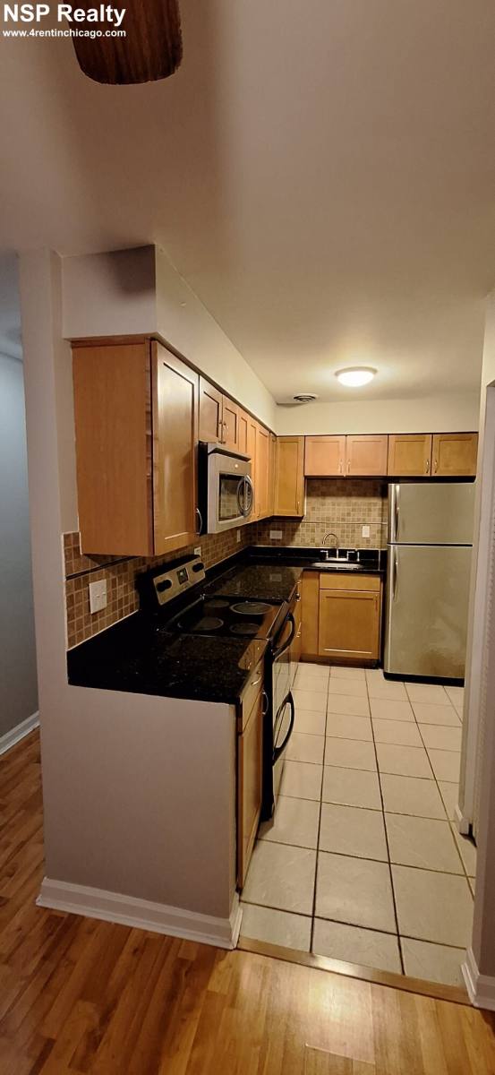 Apartment for rent at 3825 Pine Grove, Chicago, IL 60613