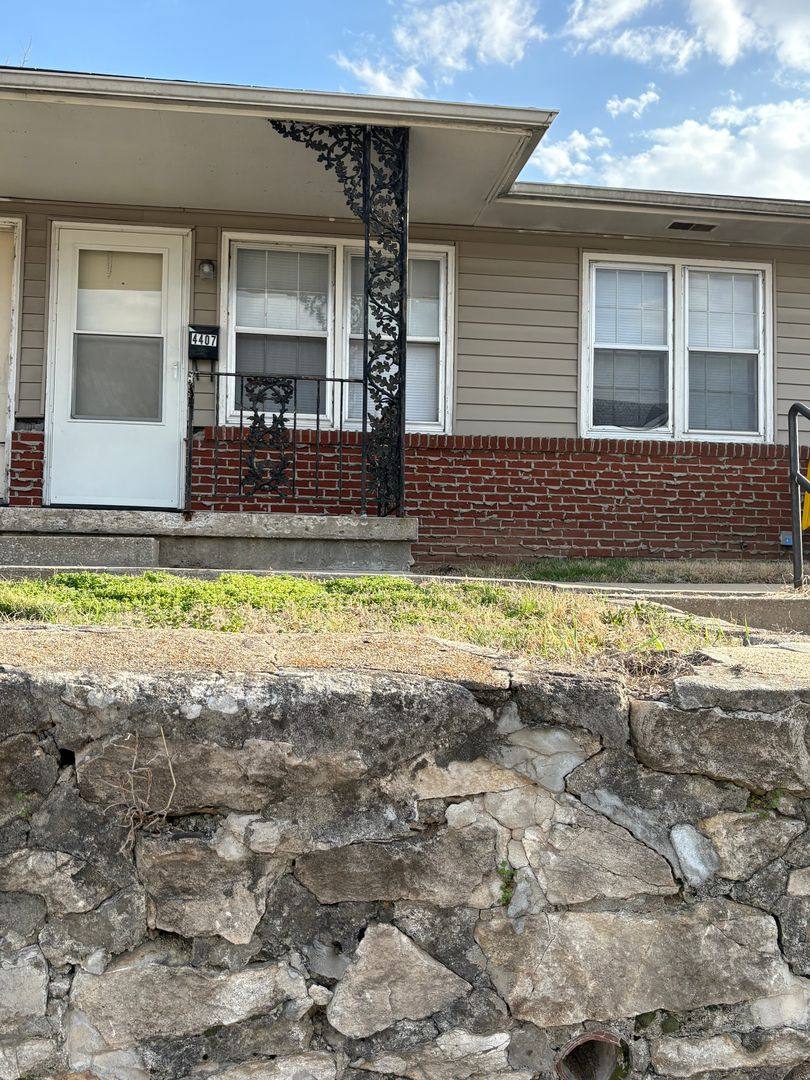 Townhouse for rent at 4407 E Linwood Blvd, Kansas City, MO 64128
