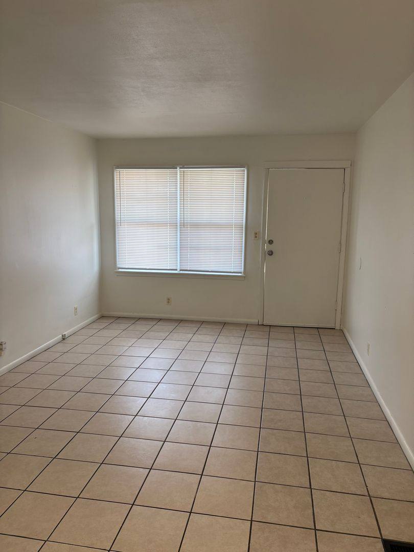Townhouse for rent at 4407 E Linwood Blvd, Kansas City, MO 64128
