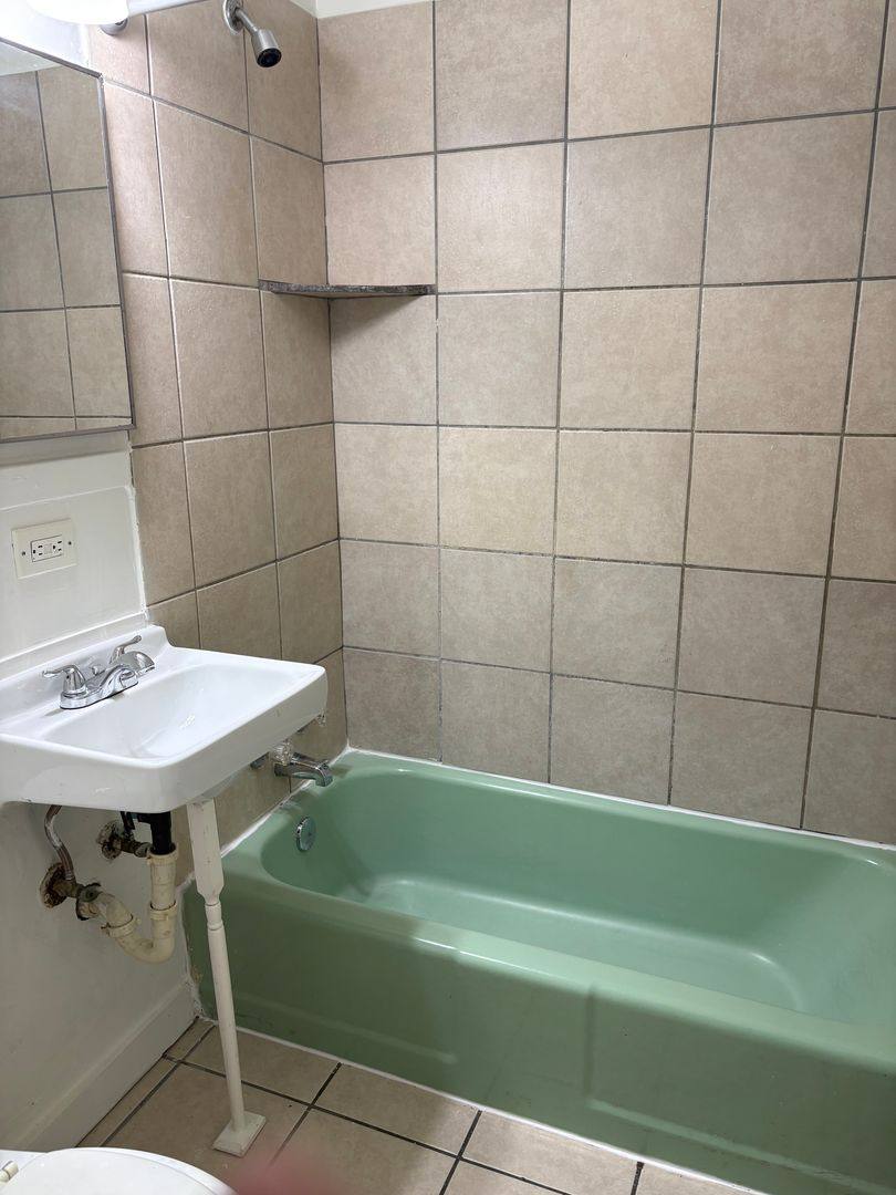 Townhouse for rent at 4407 E Linwood Blvd, Kansas City, MO 64128