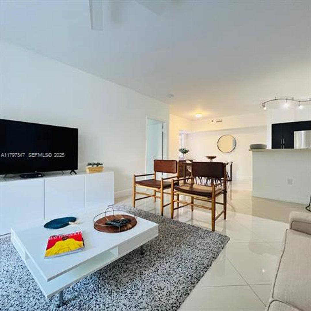 Apartment for rent at 19701 E Country Club Dr, Miami, FL 33180