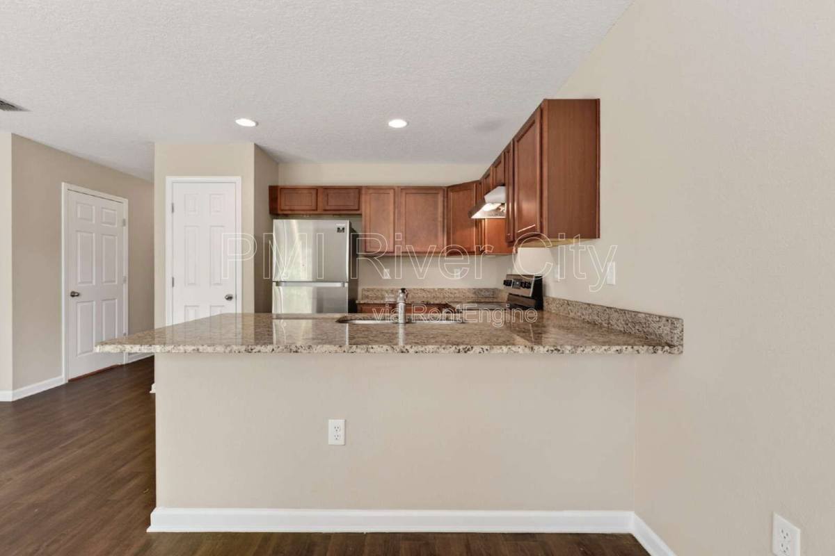 Townhouse for rent at 7608 Rain Forest Dr N, Jacksonville, FL 32277
