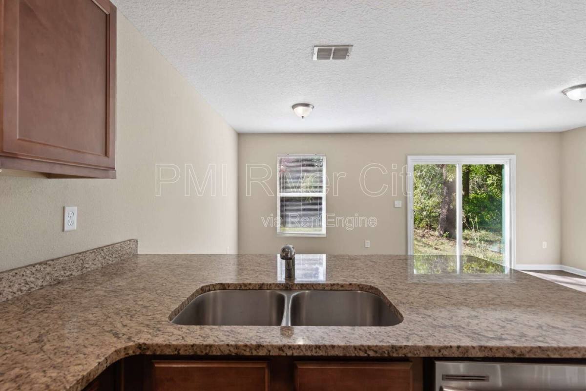 Townhouse for rent at 7608 Rain Forest Dr N, Jacksonville, FL 32277