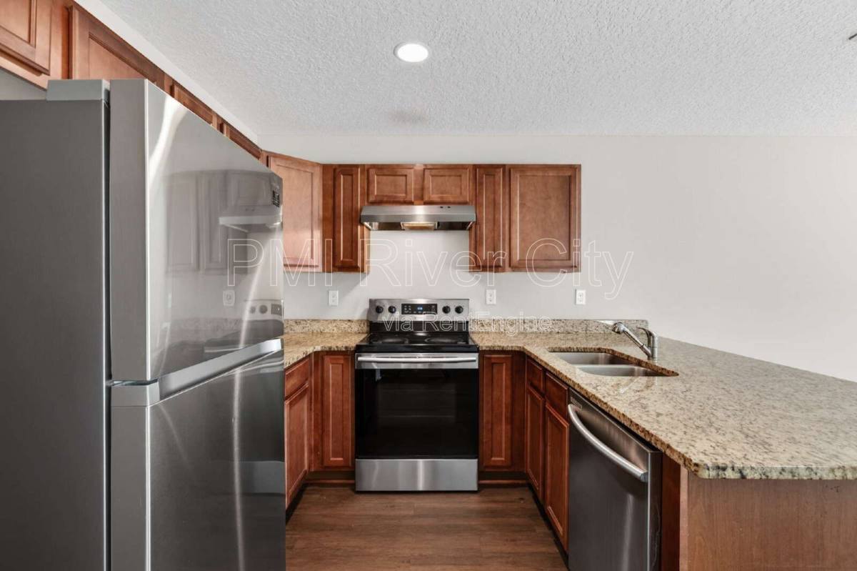 Townhouse for rent at 7608 Rain Forest Dr N, Jacksonville, FL 32277