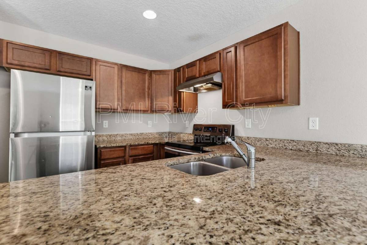 Townhouse for rent at 7608 Rain Forest Dr N, Jacksonville, FL 32277