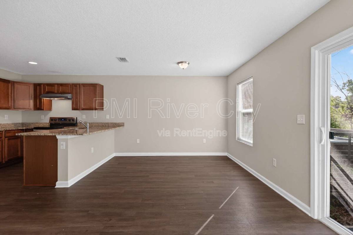 Townhouse for rent at 7608 Rain Forest Dr N, Jacksonville, FL 32277