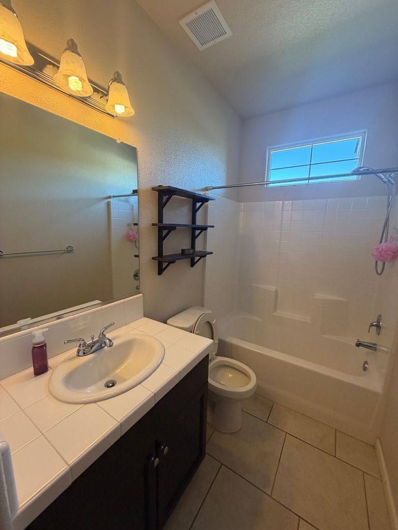House for rent at 1696 Softwind Dr, Tulare, CA 93274