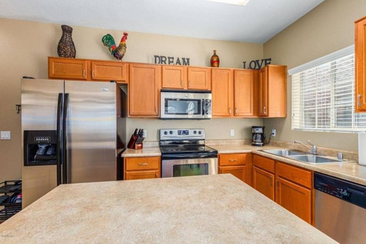 Townhouse for rent at 458 N 168th Lane, Goodyear, AZ 85338