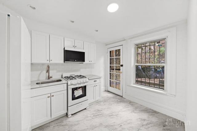 Townhouse for rent at 439 W 43rd St #1, New York, NY 10036