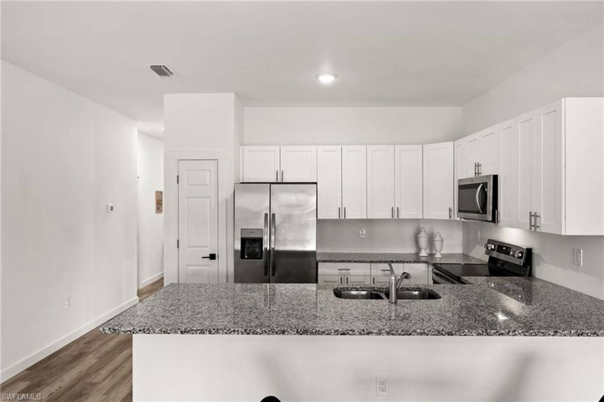 Townhouse for rent at 716 718 Gordon Ave S, Lehigh Acres, FL 33973