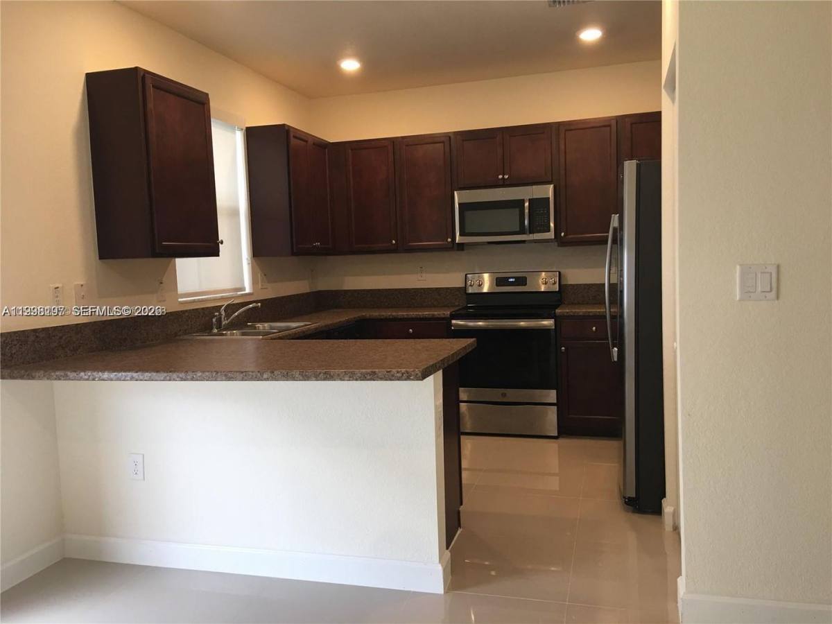Townhouse for rent at 10323 W 34th Lane, Hialeah, FL 33018