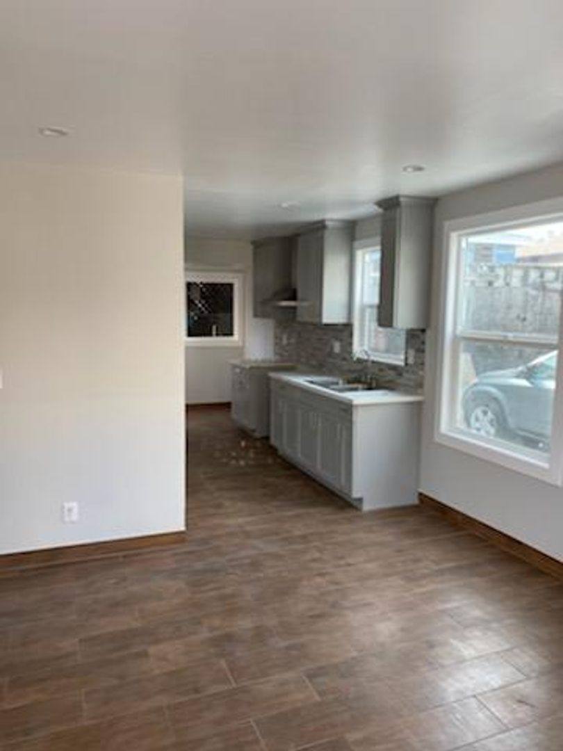 Apartment for rent at 1411-1413 E 53rd St, Los Angeles, CA 90011