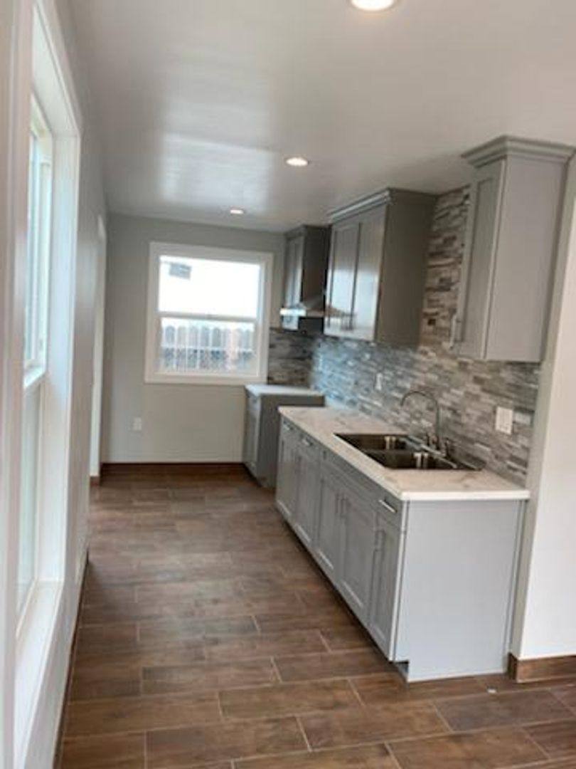 Apartment for rent at 1411-1413 E 53rd St, Los Angeles, CA 90011