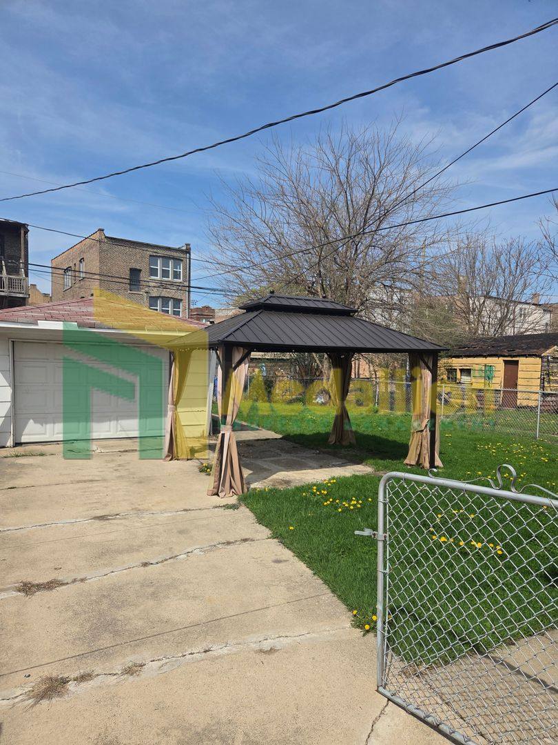 House for rent at 11004 S Eberhart Ave, Chicago, IL 60628