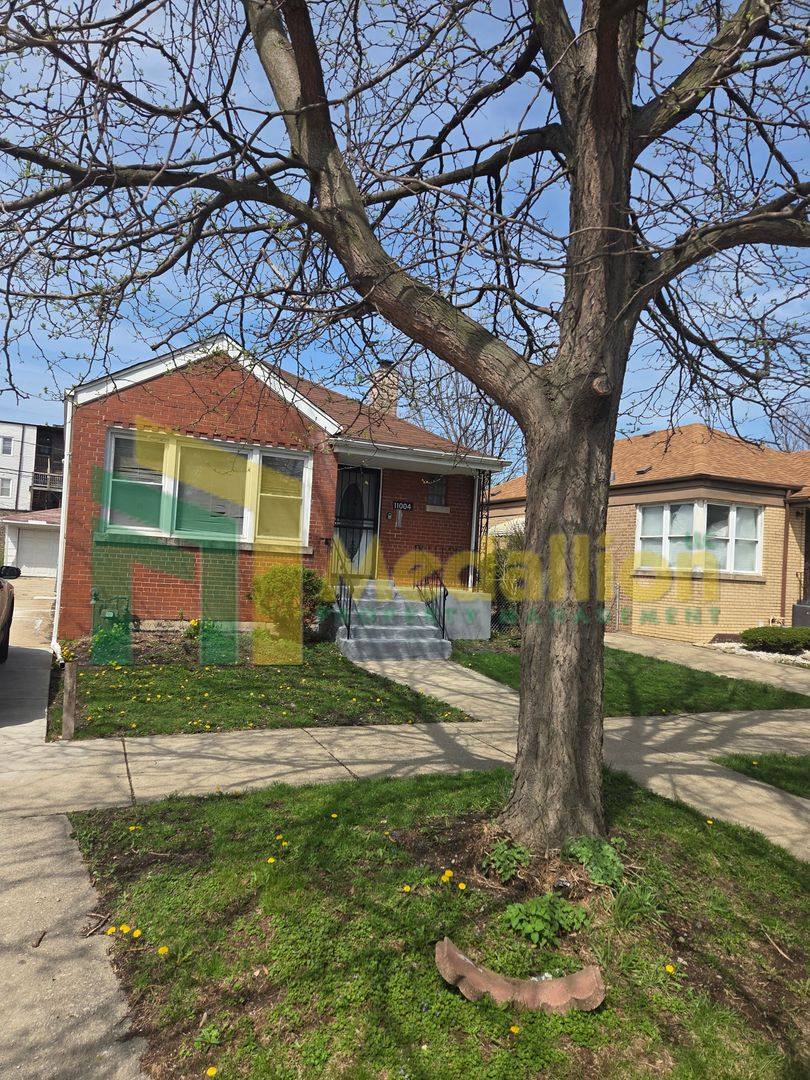 House for rent at 11004 S Eberhart Ave, Chicago, IL 60628