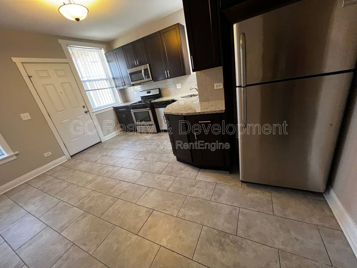 Condo for rent at 6031 S Eberhart Ave #2, Chicago, IL 60637