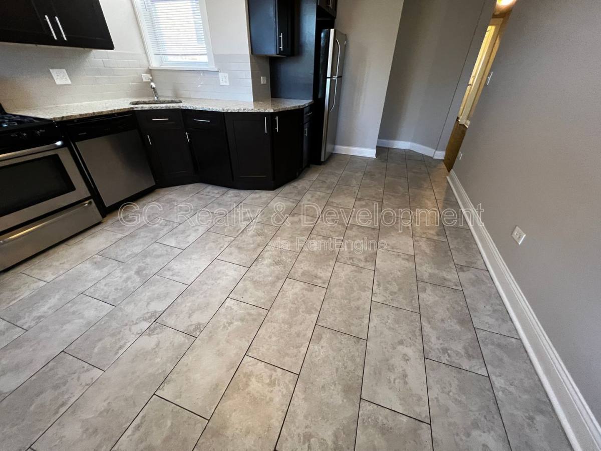 Condo for rent at 6031 S Eberhart Ave #2, Chicago, IL 60637