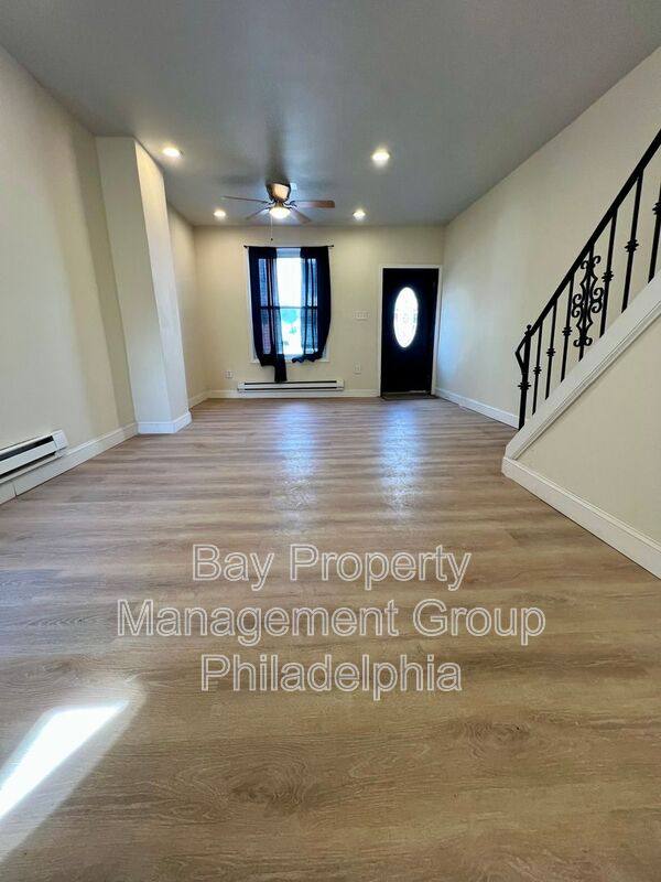 Townhouse for rent at 124 E Wishart St, Philadelphia, PA 19134