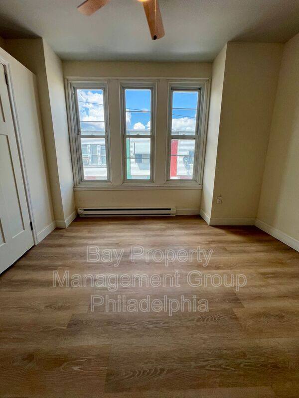 Townhouse for rent at 124 E Wishart St, Philadelphia, PA 19134