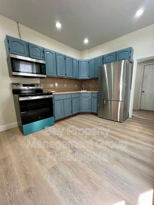 Townhouse for rent at 124 E Wishart St, Philadelphia, PA 19134