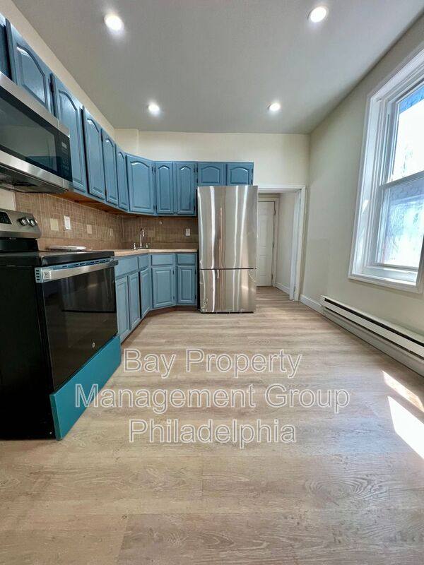 Townhouse for rent at 124 E Wishart St, Philadelphia, PA 19134