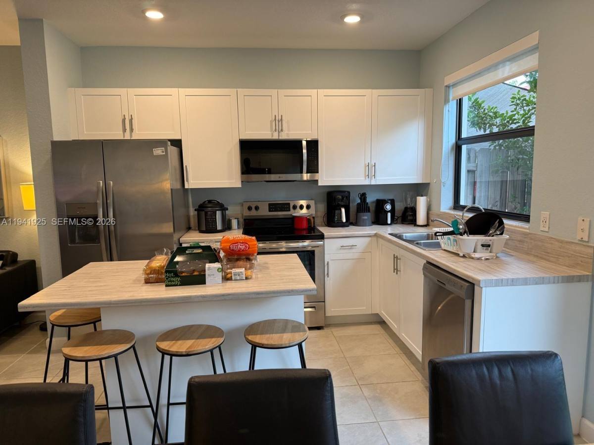 Townhouse for rent at 887 NE 211th St #887, Miami, FL 33179