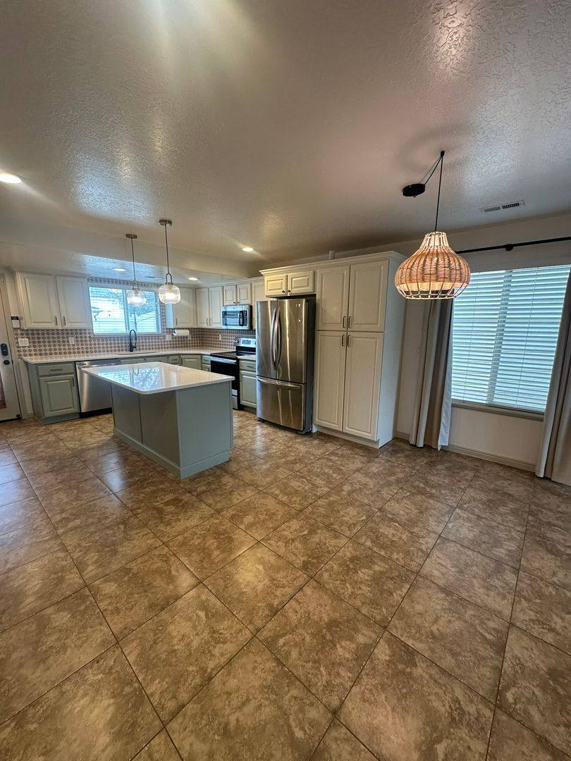 House for rent at 1584 E Sandalwood Dr, Ogden, UT 84405