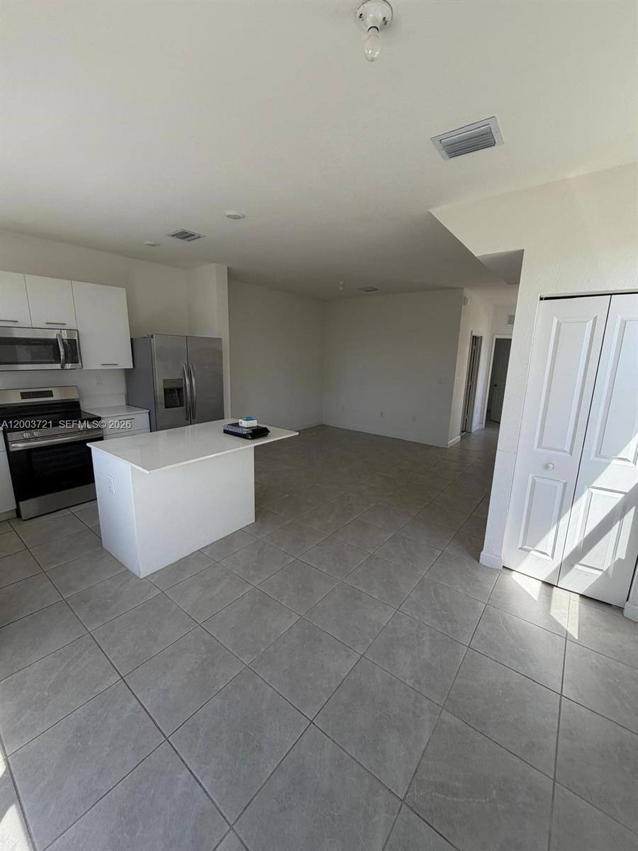 Townhouse for rent at 12148 NW 24th Place, Miami, FL 33147