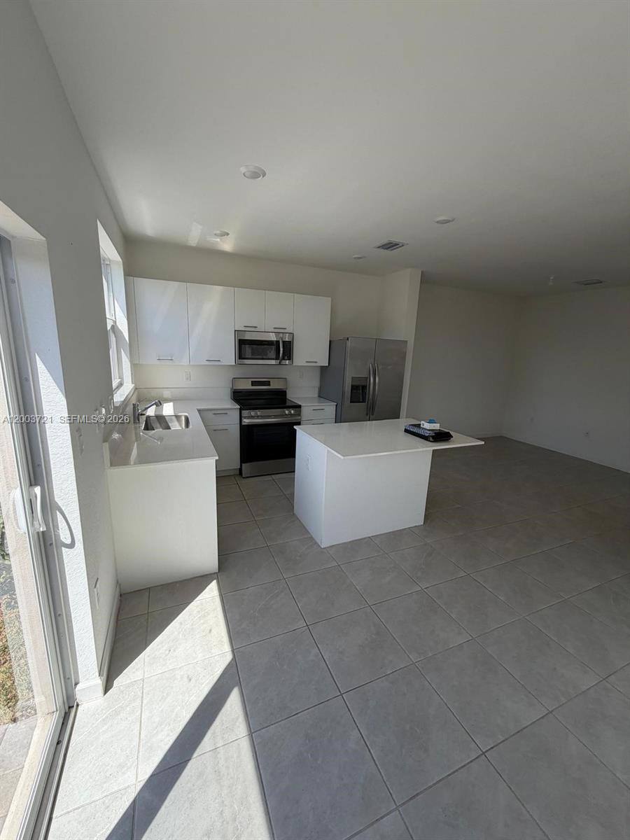 Townhouse for rent at 12148 NW 24th Place, Miami, FL 33147