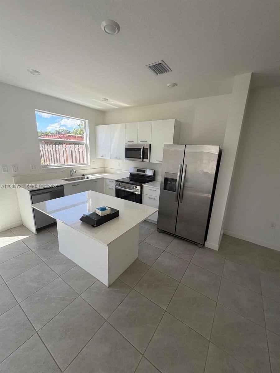 Townhouse for rent at 12148 NW 24th Place, Miami, FL 33147