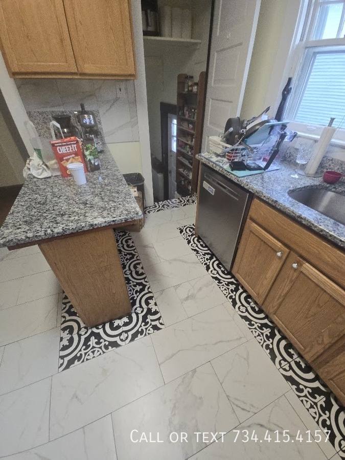 House for rent at 818 Packard St #THE M Blue Sign, Ann Arbor, MI 48104