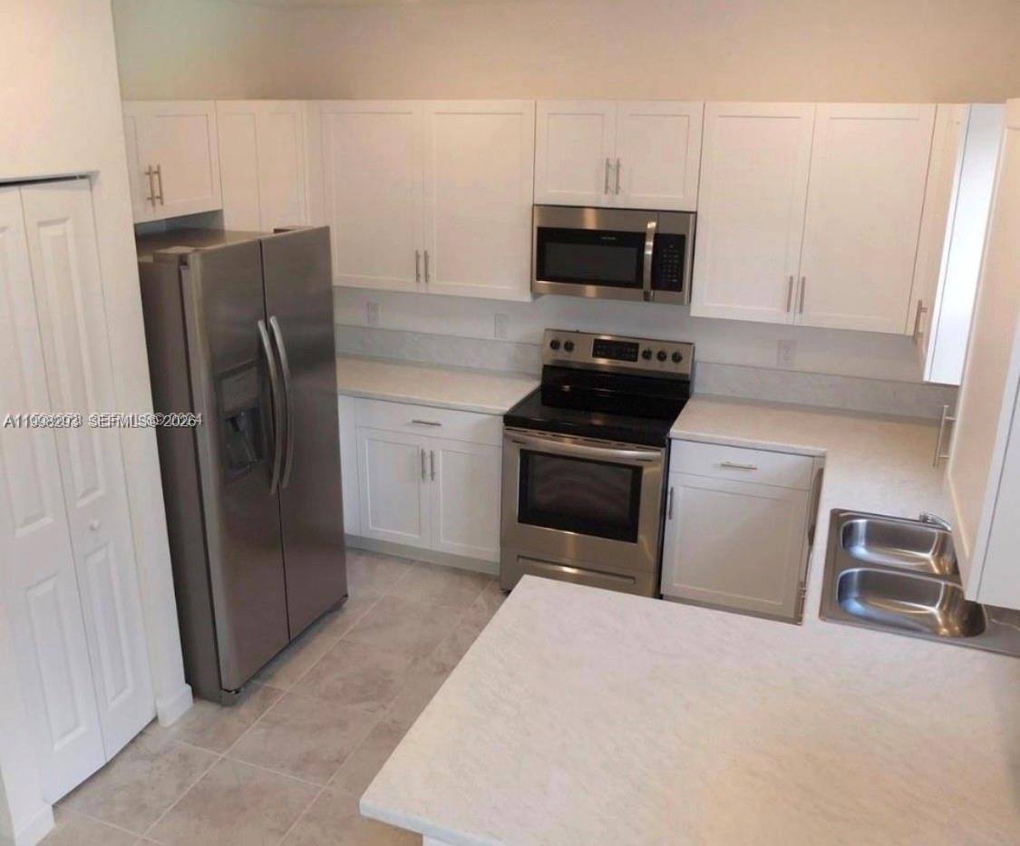 Townhouse for rent at 407 NE 208th Terrace #407 Mi, Miami, FL 33179