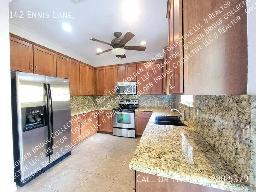 Townhouse for rent at 142 Ennis Lane, Jupiter, FL 33458