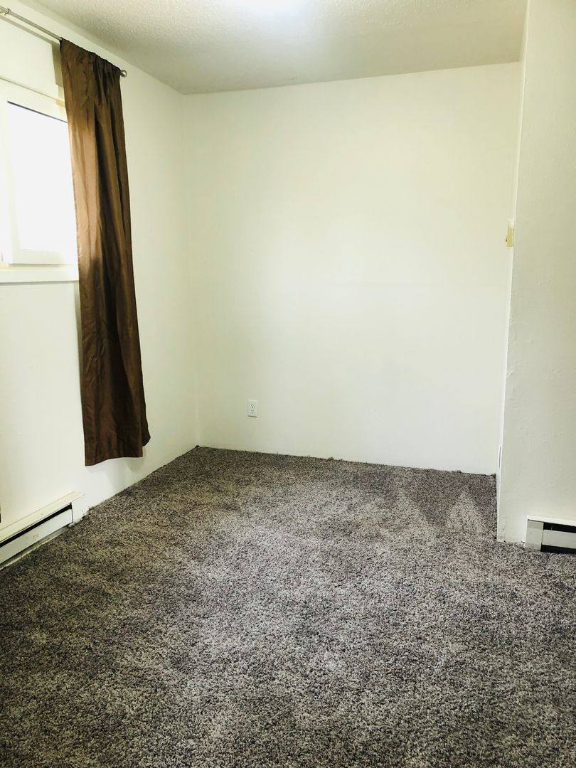 House for rent at 114 4th Ave NW, Minot, ND 58703