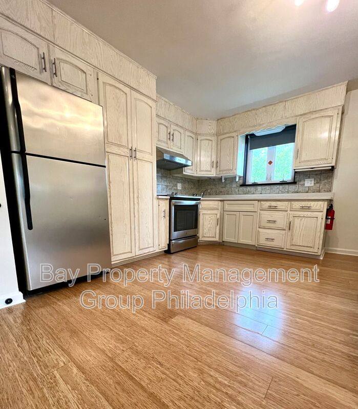 Townhouse for rent at 569 Domino Lane, Philadelphia, PA 19128