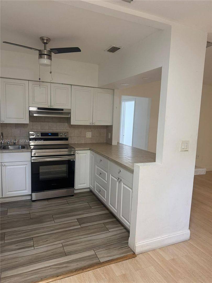 House for rent at 411 NW 106th St, Miami, FL 33150