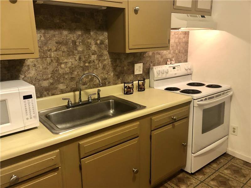 Townhouse for rent at 1462 Crittenden Rd, Rochester, NY 14623