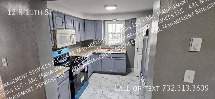 Townhouse for rent at 12 N 11th St, Newark, NJ 07107