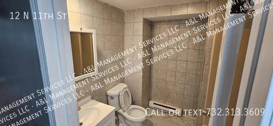 Townhouse for rent at 12 N 11th St, Newark, NJ 07107