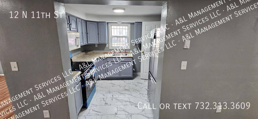 Townhouse for rent at 12 N 11th St, Newark, NJ 07107