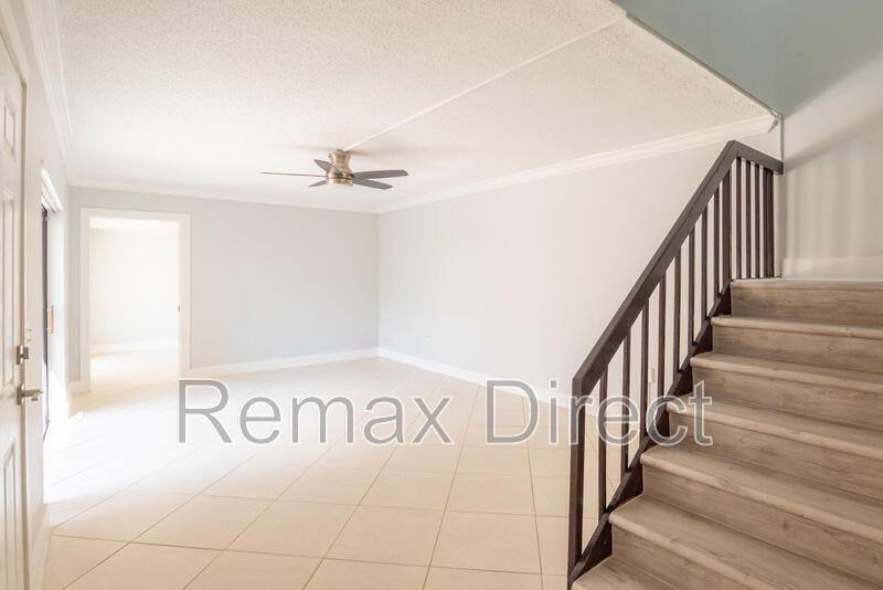 Townhouse for rent at 1700 Embassy Dr #305, West Palm Beach, FL 33401